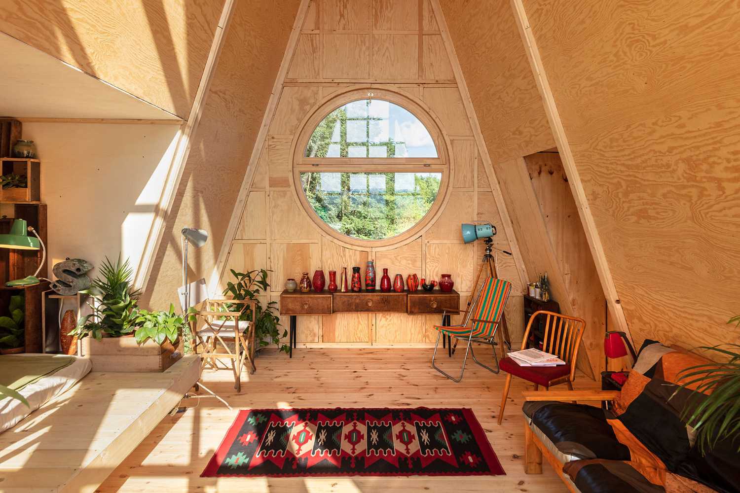 Wooden cabin with triangular shape
