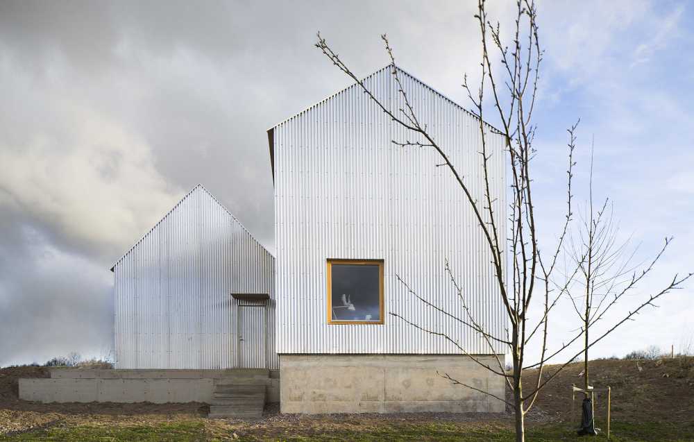 House with corrugated aluminium cladding
